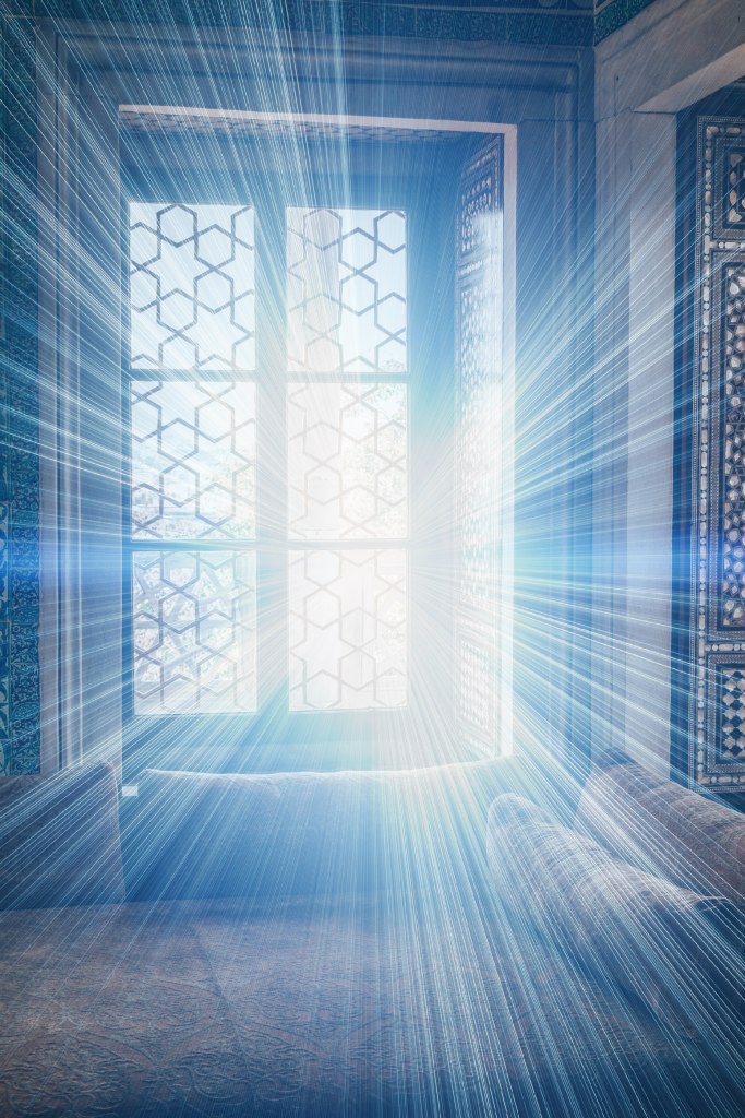 A windowpane with bright light flowing through